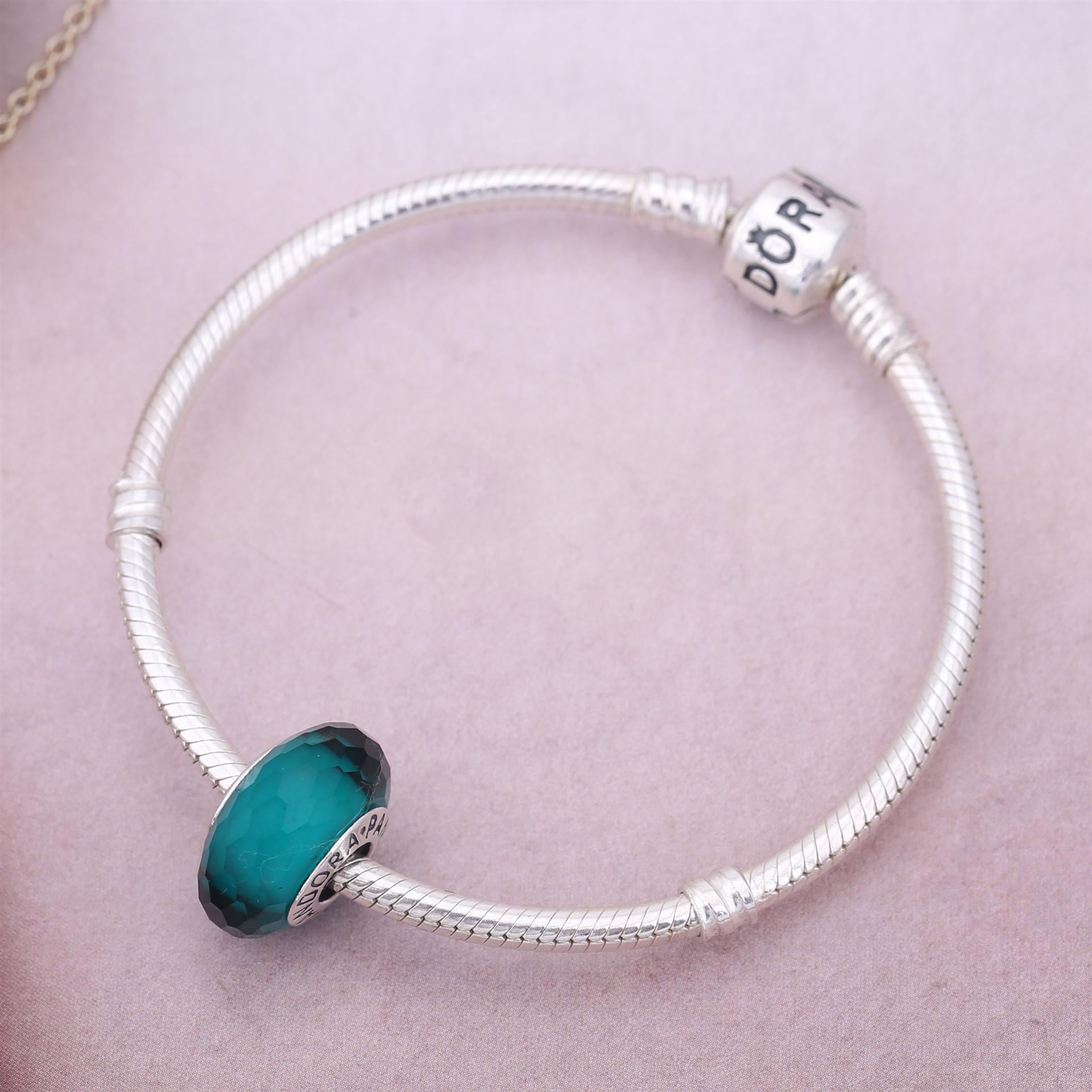 PANDORA Teal Faceted Glass Bedel - 791606